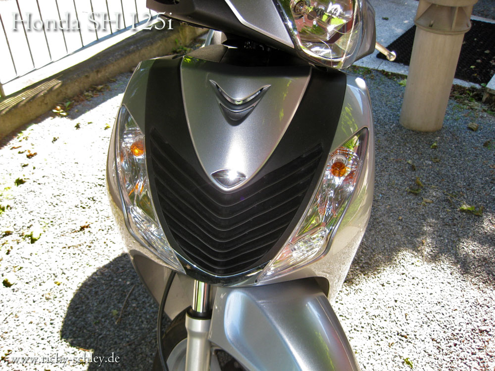 Honda Sh125i Motorroller silber Blinker